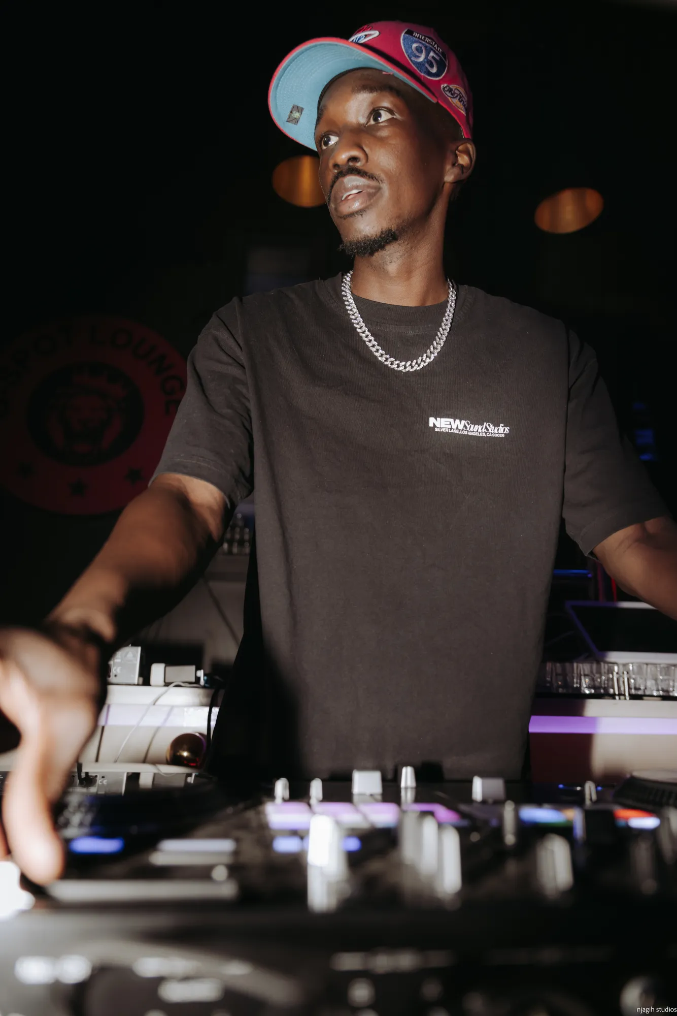 DJ portrait performing live set at lounge event - Njagih Studios event photography