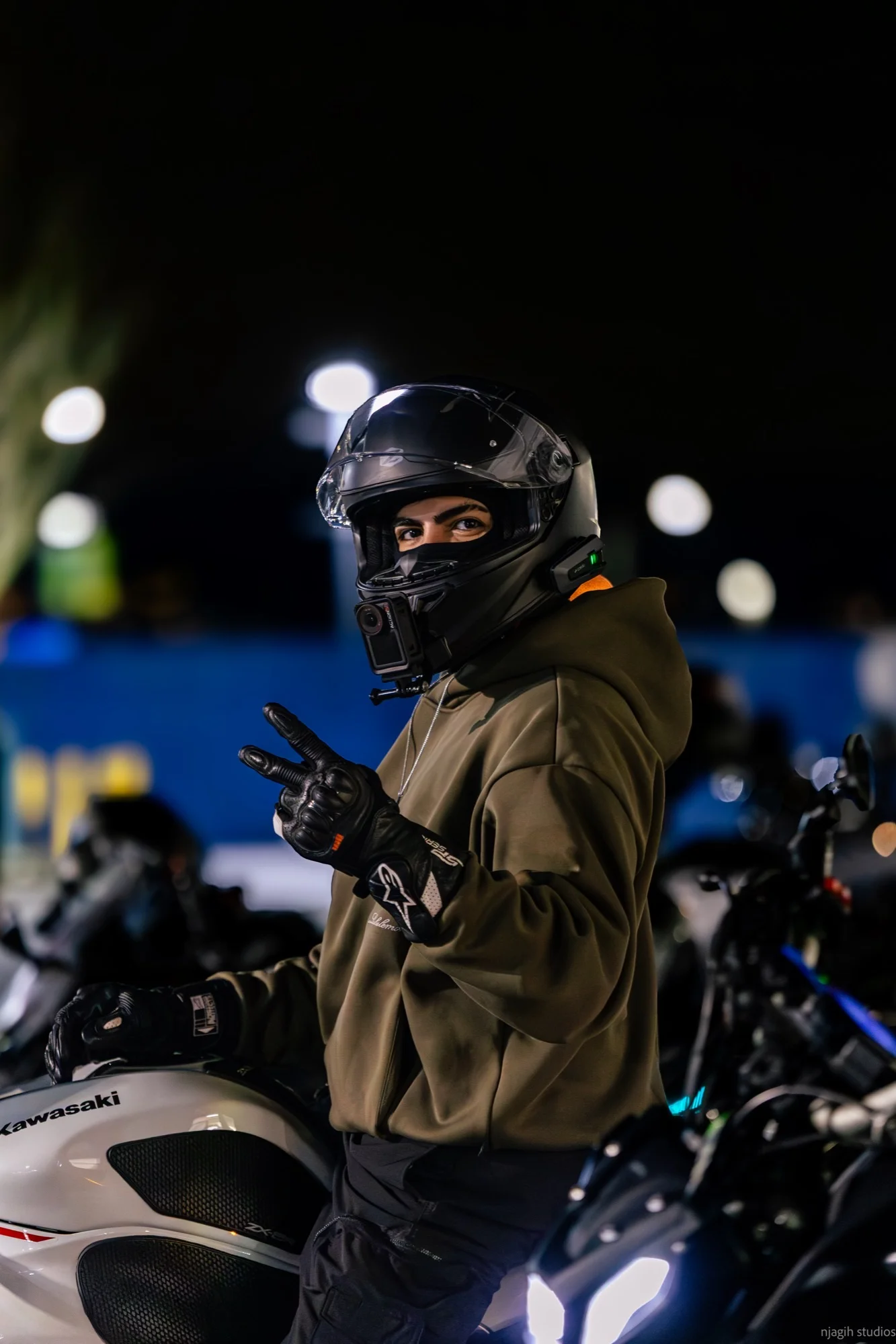 Motorcycle rider portrait with Kawasaki and GoPro helmet cam at Vancouver night meetup - Njagih Studios